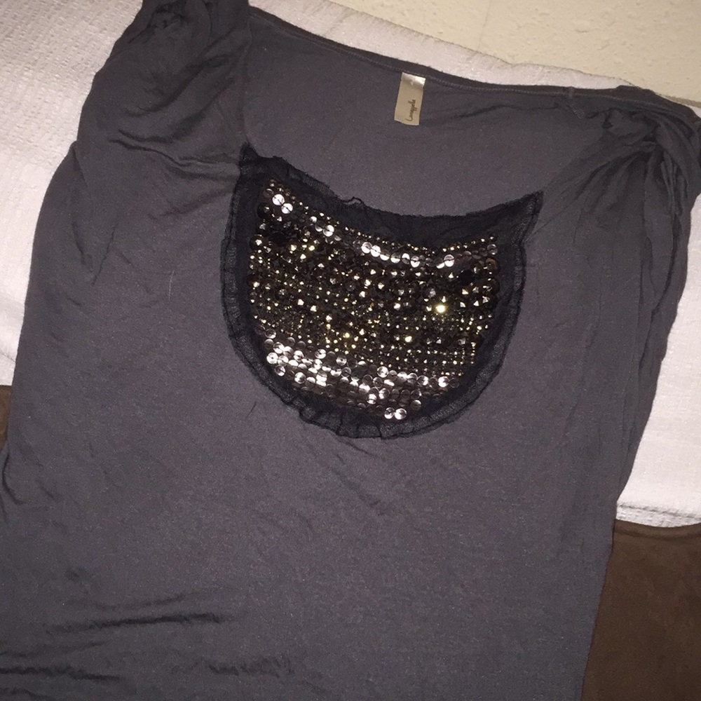Loveapella top adorned with silver beads.